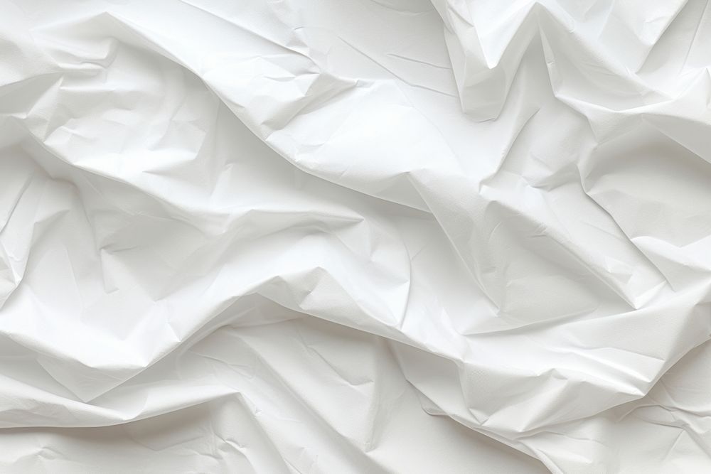 Crumpled paper background white backgrounds material.