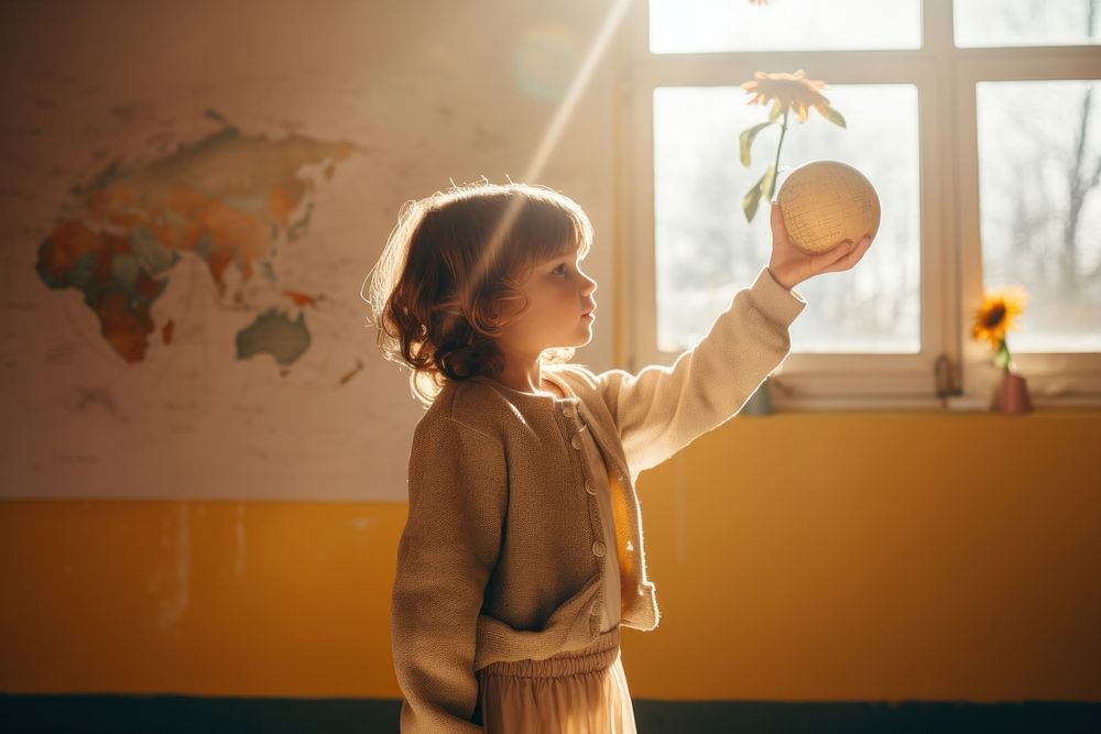 Autistic child holding in a minimalist sunlight photo architecture.