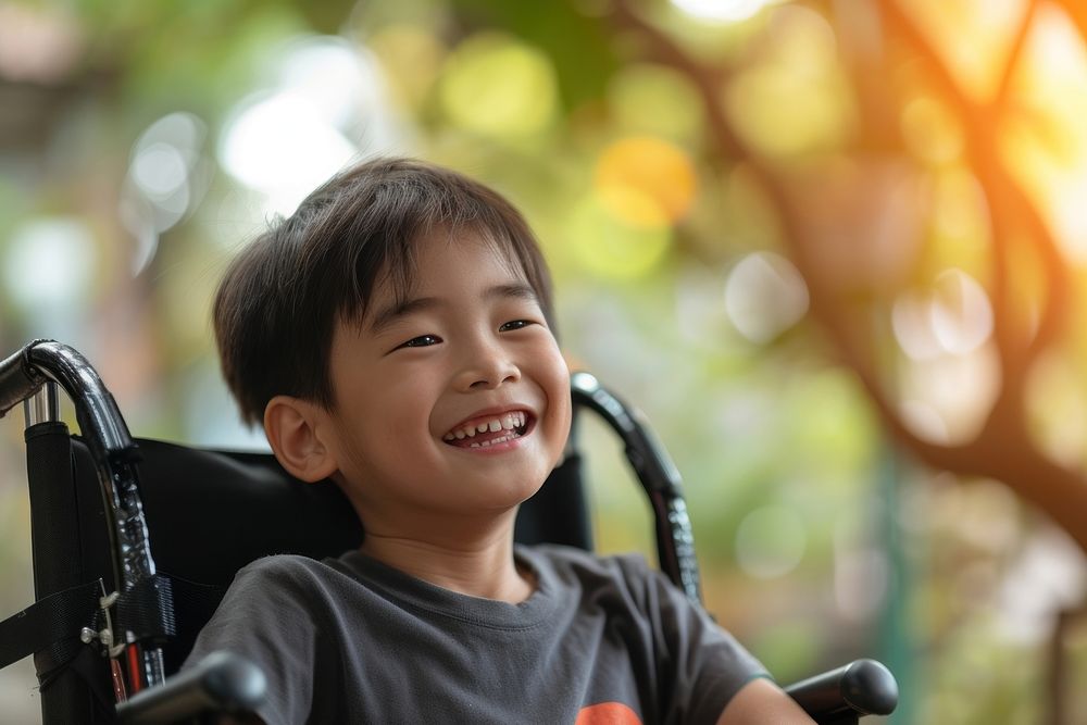 Asian boy on wheelchair smiling smile child.