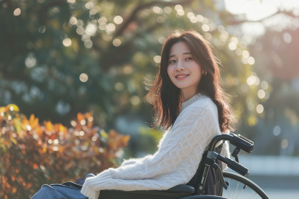 Asian girl on wheelchair smiling sitting smile.