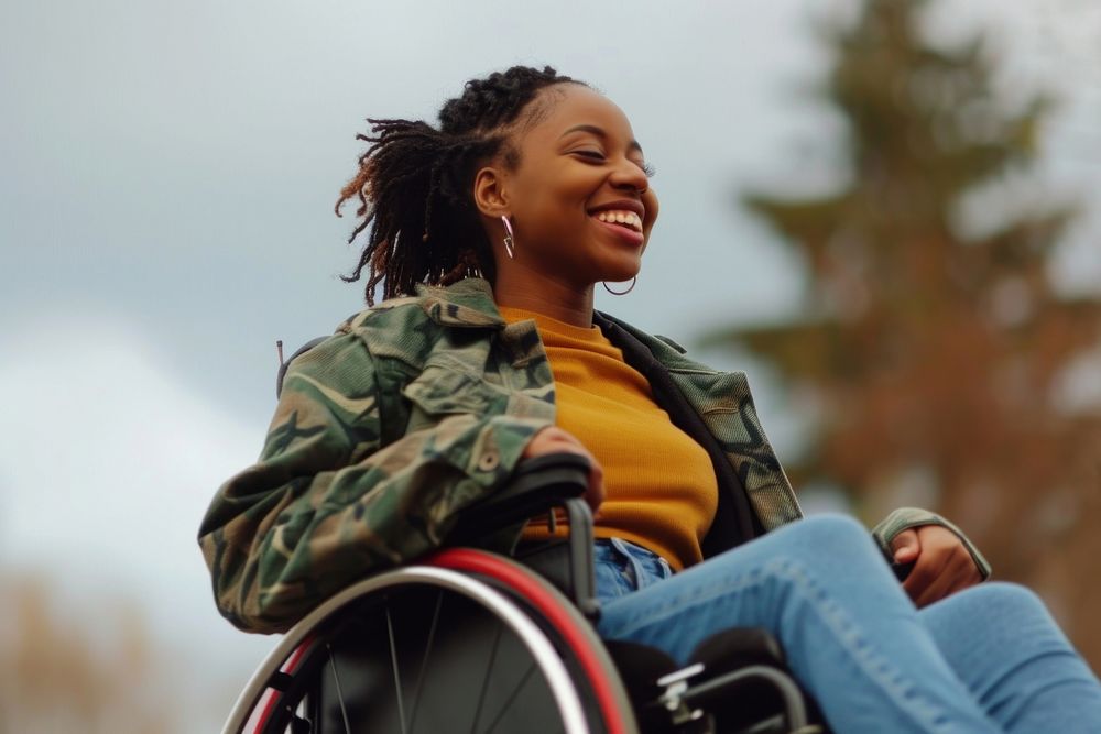 Black girl on wheelchair smiling smile adult.
