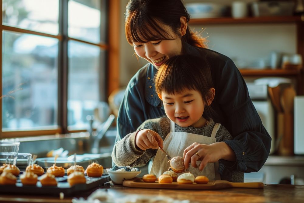 Japanese mother and son decorating donuts food togetherness accessories.