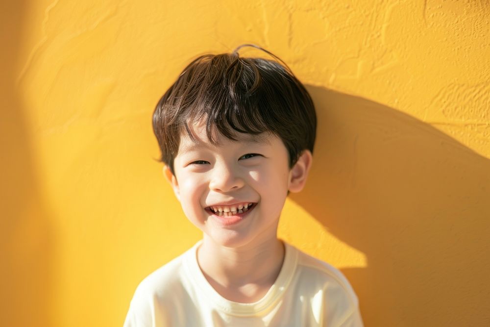 Kid laughing portrait smiling.