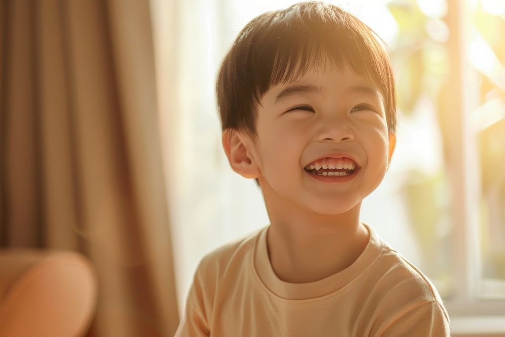 Kid laughing smiling smile.