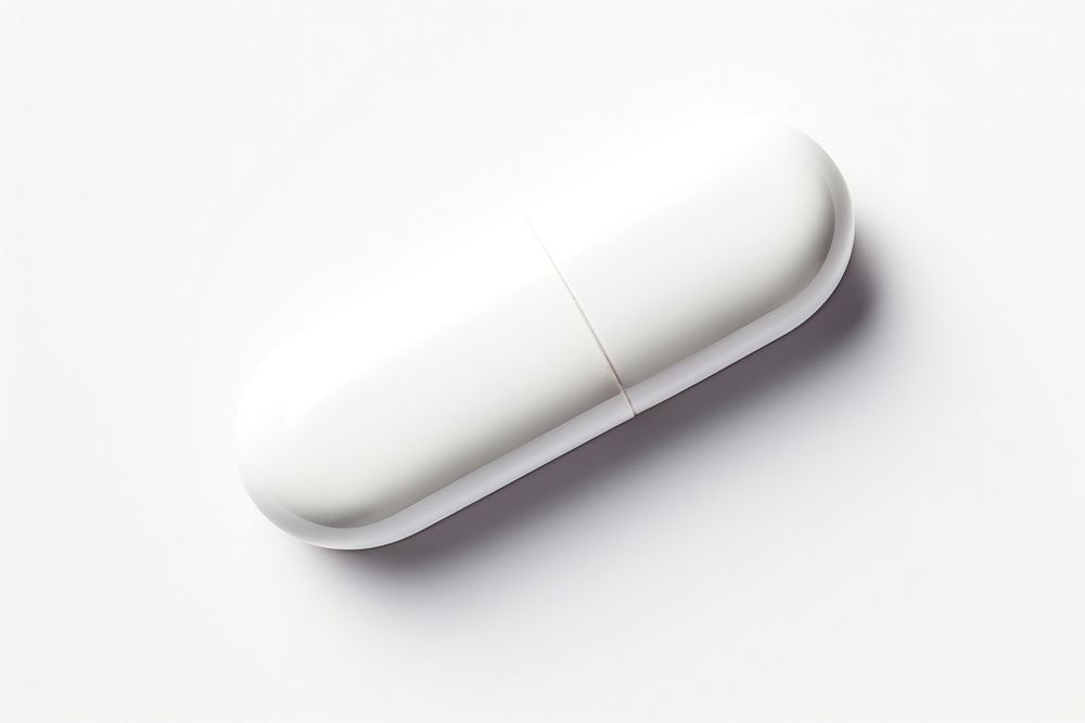 White pill capsule white white background.