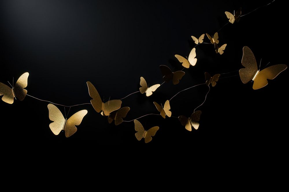 Gold butterflies lighting nature leaf.
