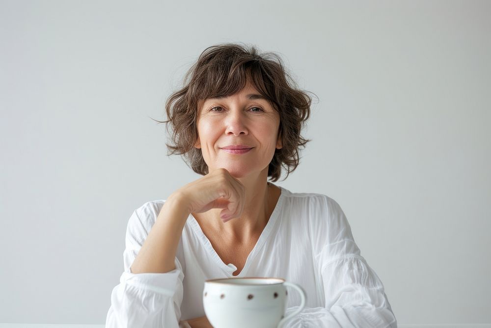 Mature woman in tea time portrait coffee adult.