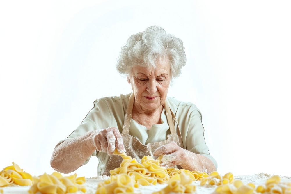 Mature woman watching tutorials for making pasta adult retirement freshness.