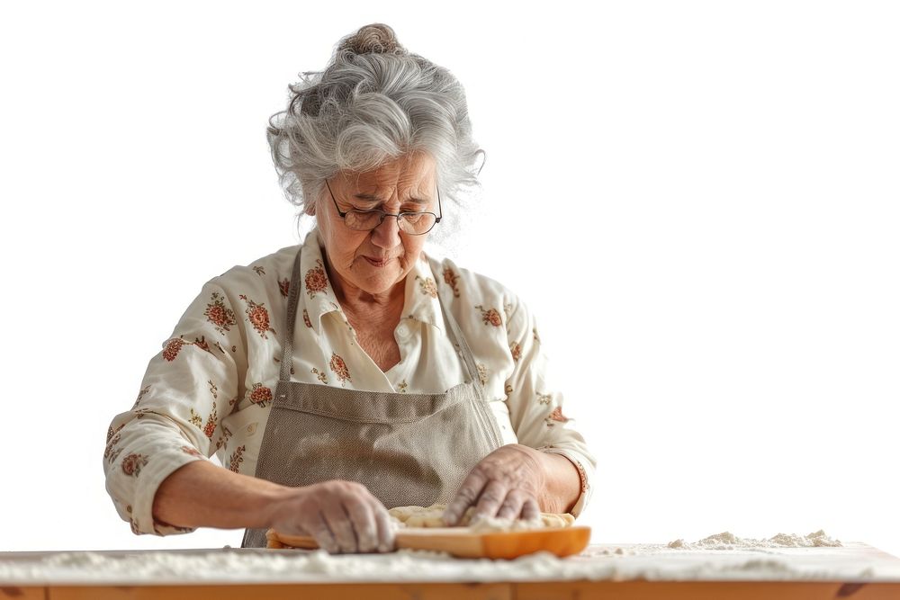 Mature woman watching tutorials for makingbakery adult white background concentration.