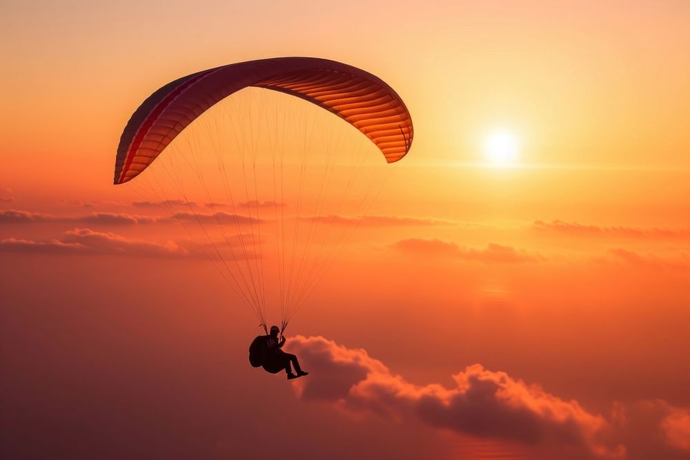 Paragliding recreation adventure dawn.