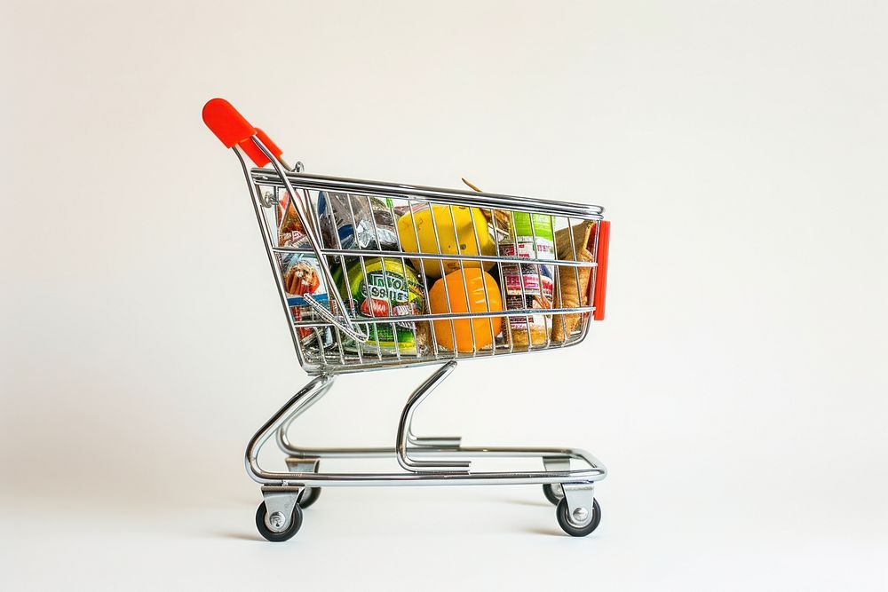 Grocery shopping cart food white background consumerism.