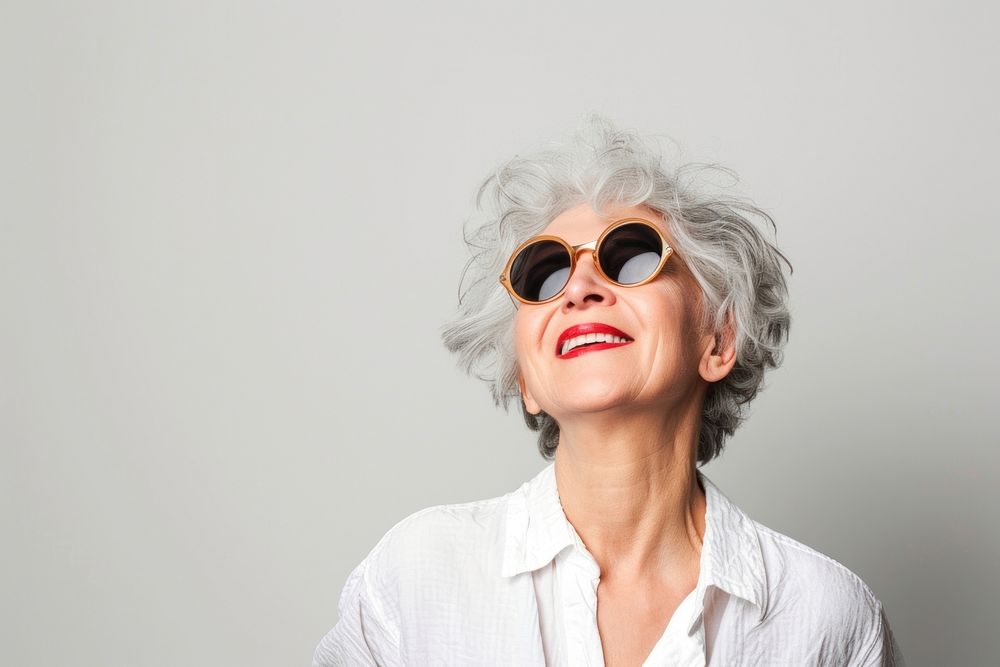 Joyful mature women people sunglasses laughing portrait.
