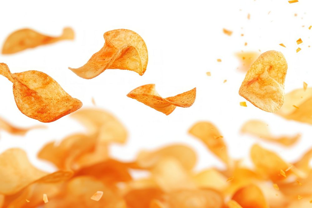 Photo of flying chips backgrounds snack food.