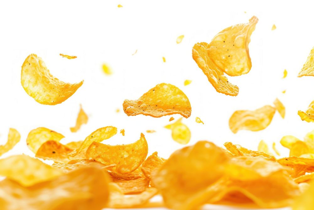 Photo of flying chips backgrounds snack food.