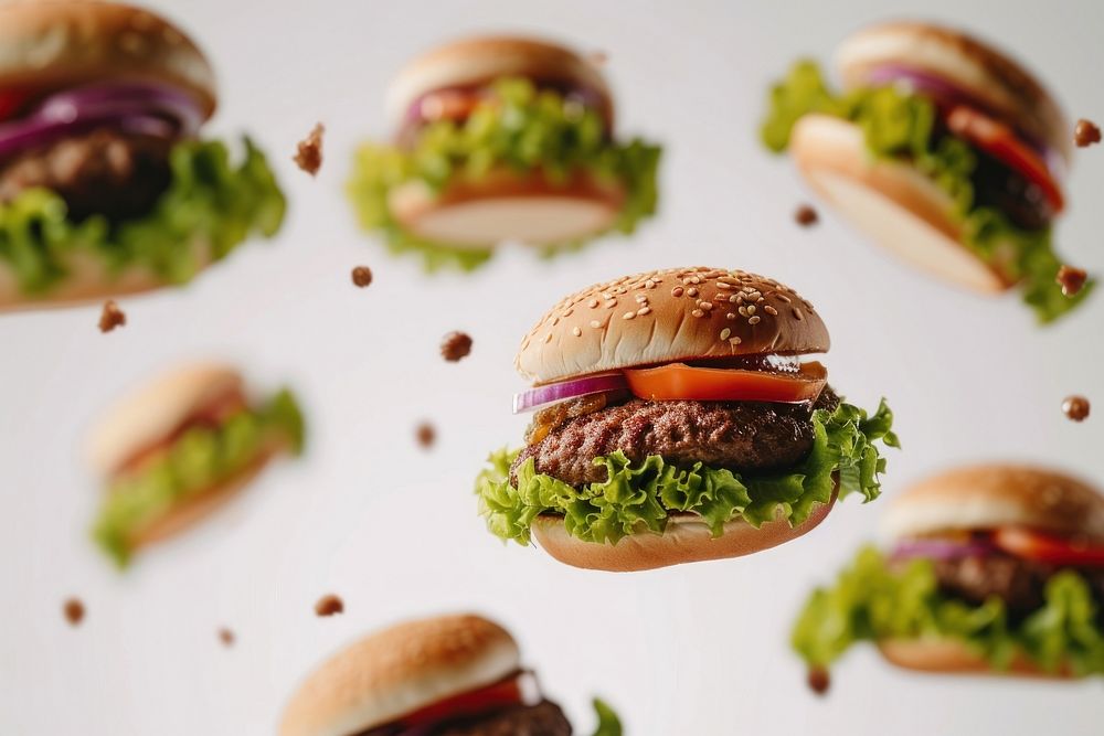 Photo of flying hamburgers food meal vegetable.