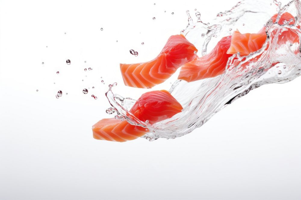 Photo of flying salmons sashimi seafood red freshness.