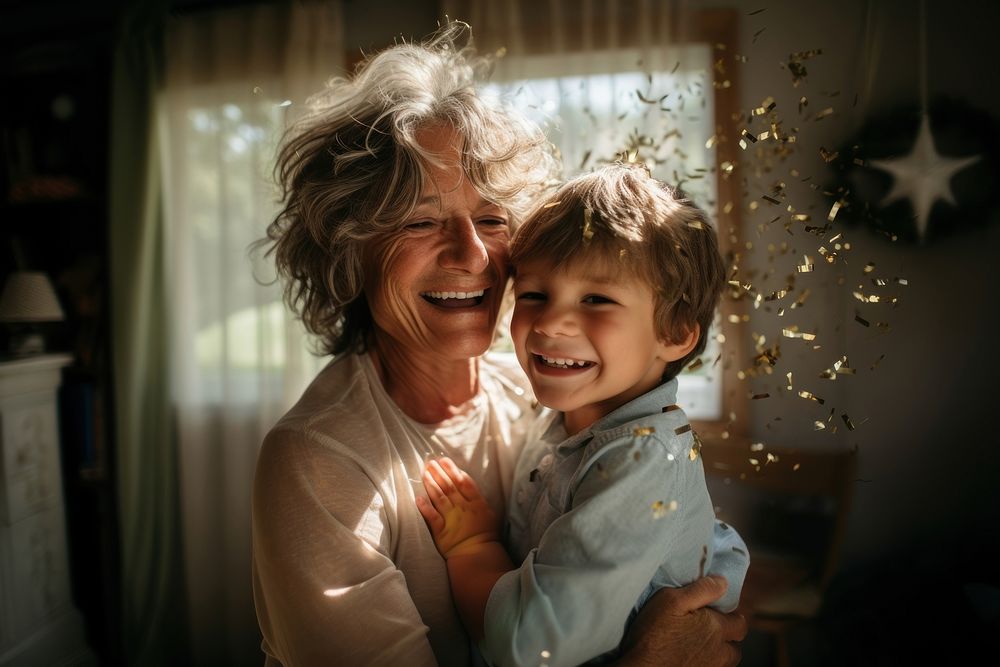 Little boy hug her grandmother laughing portrait photo.