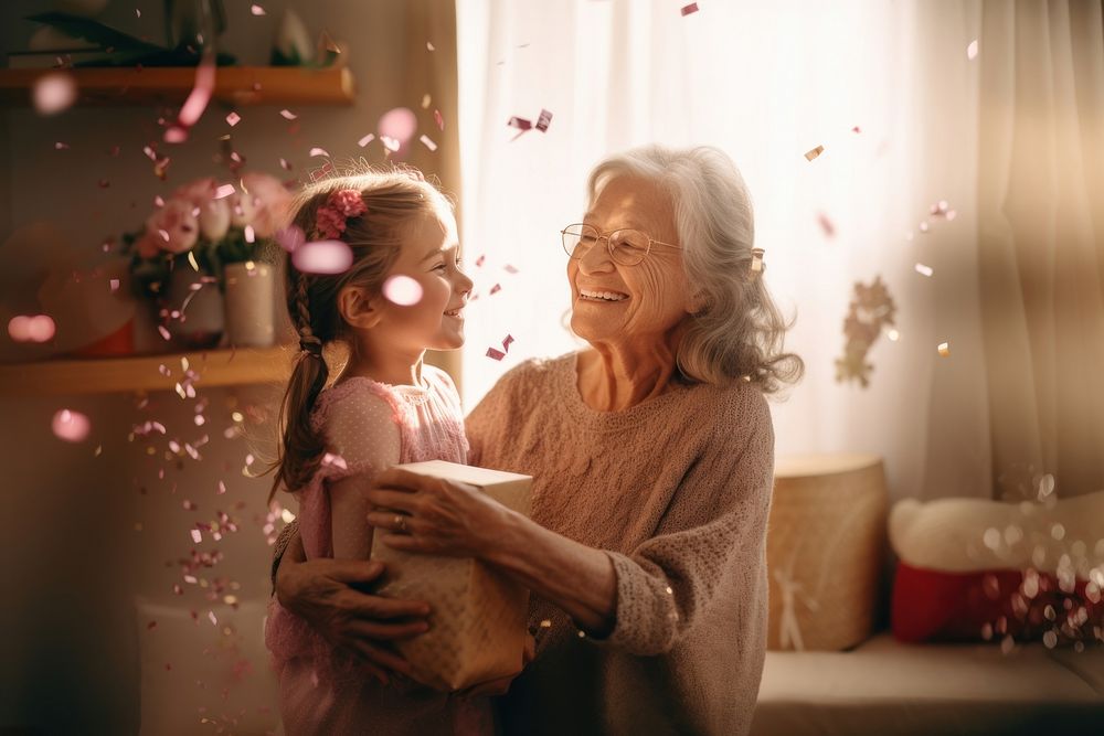 Little girl hug her grandmother light togetherness illuminated.