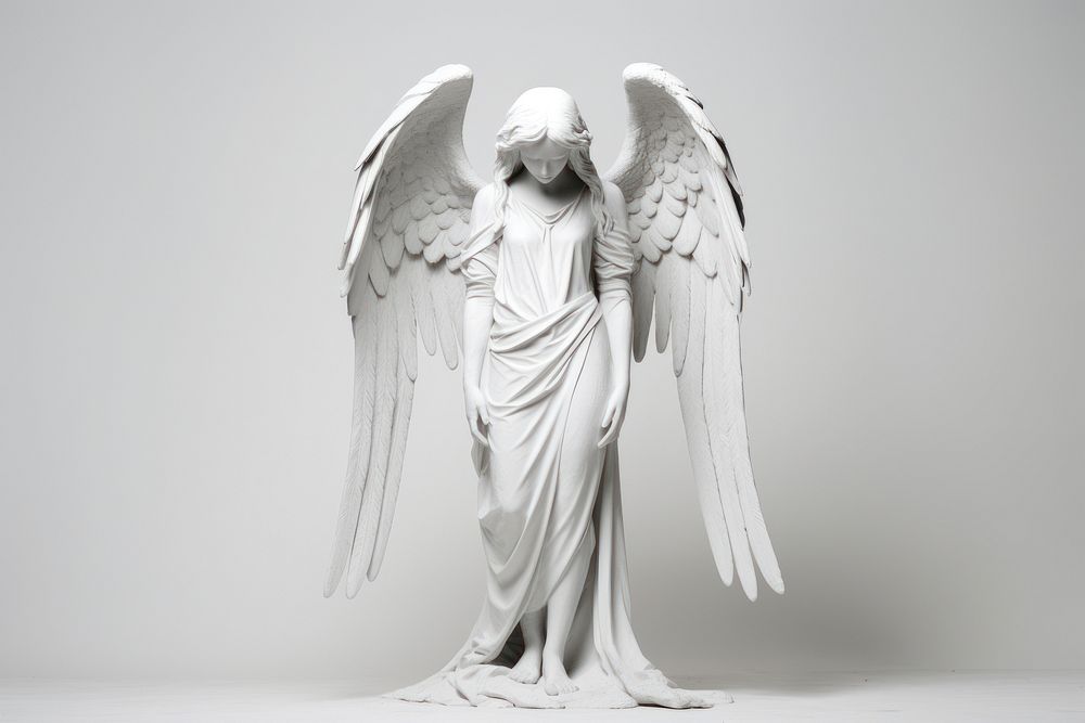 White guardian angel sculpture bird representation.