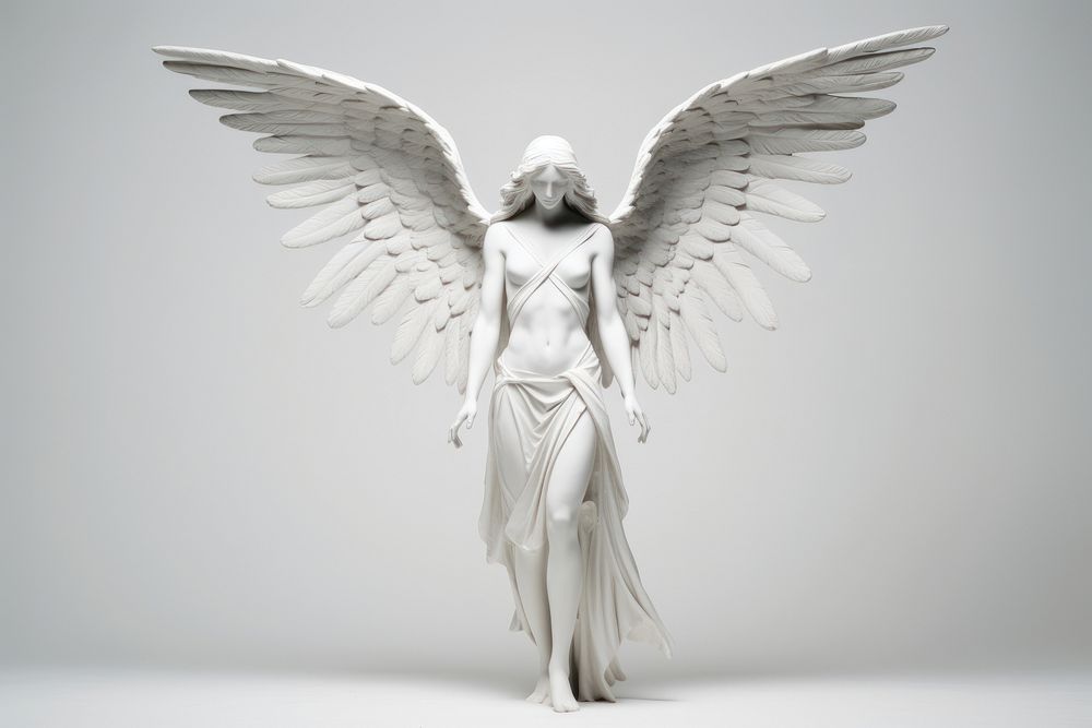 White guardian angel sculpture adult representation.