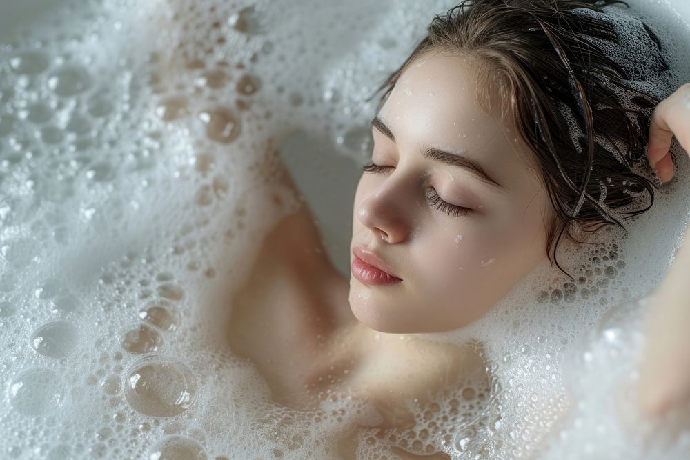 Woman in a bathtub portrait bathing bubble.