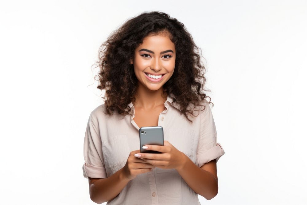 Young adult smiling happy pretty latin woman holding mobile phone device smile photo white background.