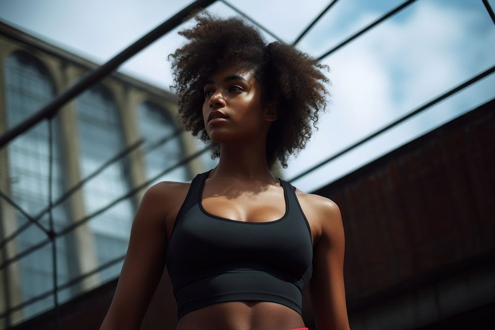 Black woman in sportswear adult determination bodybuilding.