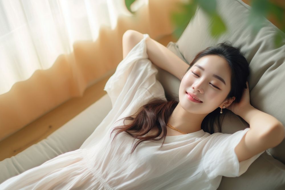 Korean woman with smartphone sleeping blanket adult.