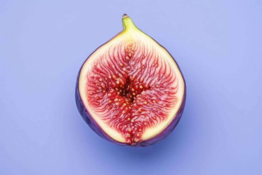Whole fig with half cut fig fruit plant food.