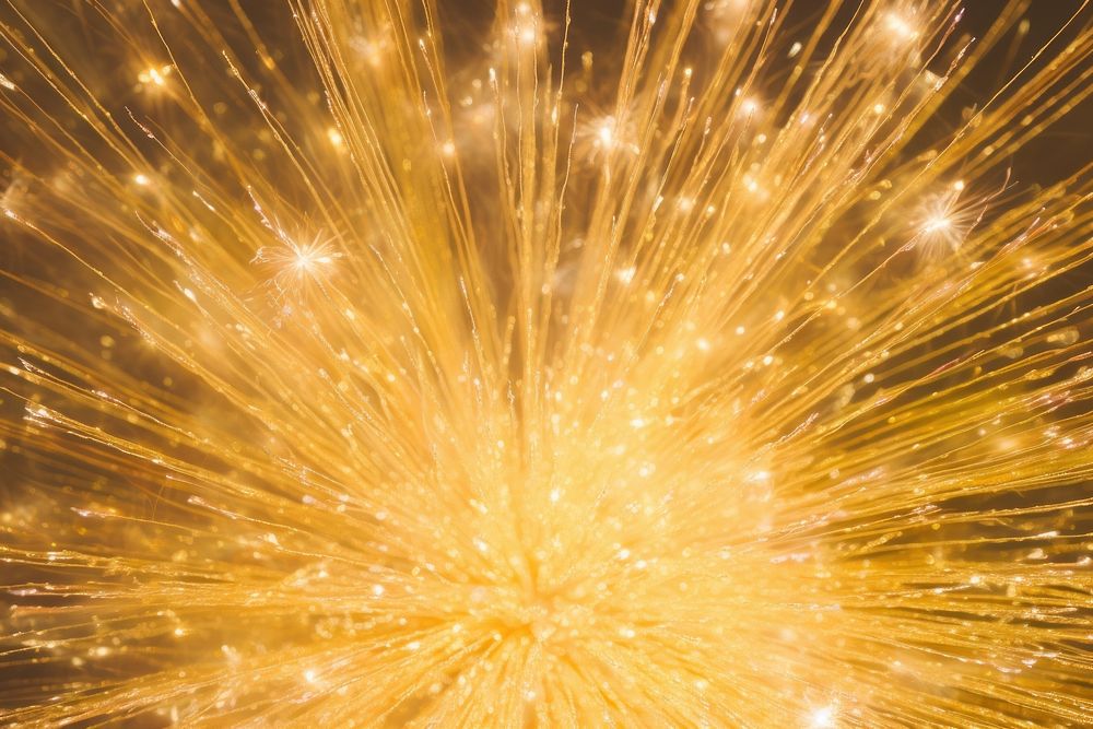 Golden sparkle backgrounds fireworks sparks.