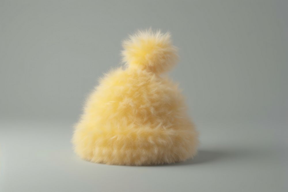 Yellow santa hat mammal softness clothing.