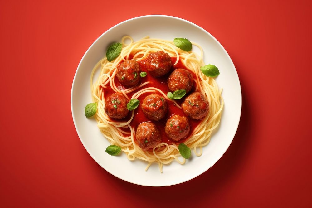Meatball pasta spaghetti plate food.