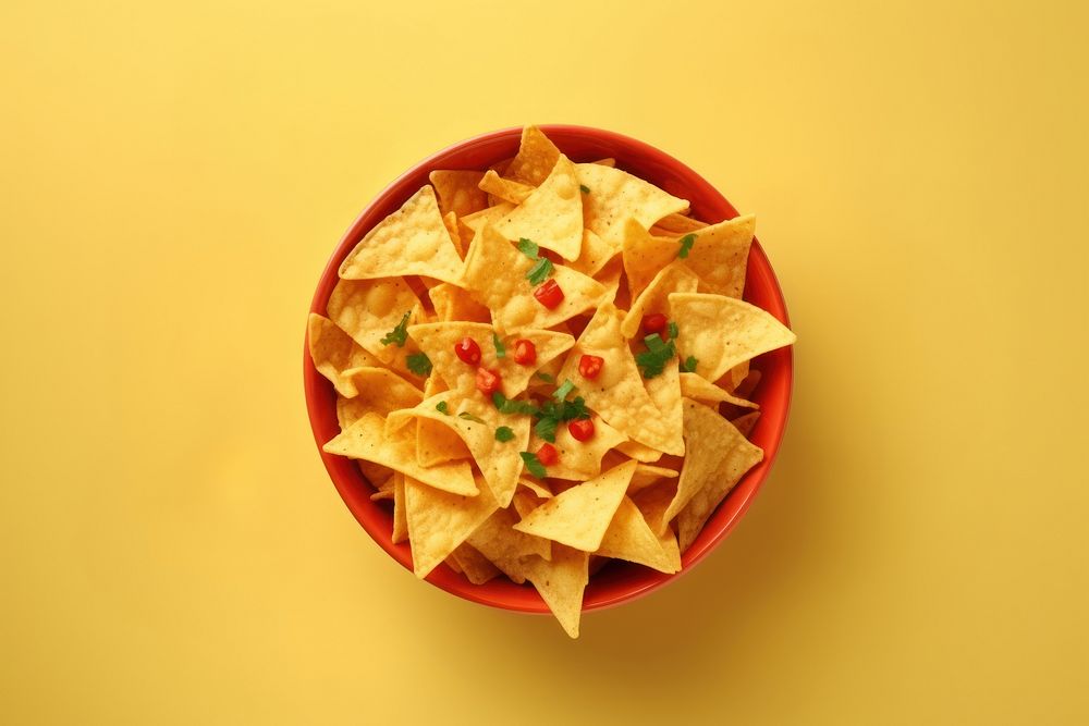 Bowl of nachos food snack freshness.