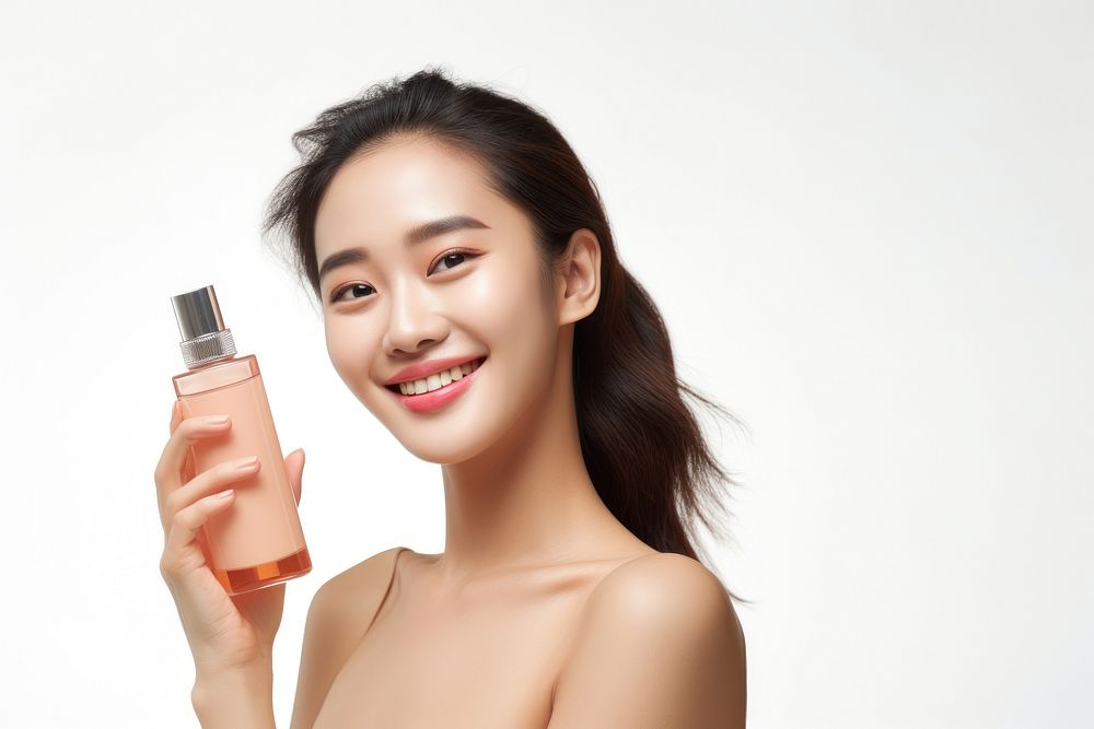 A young Filipino woman with cosmetic product cosmetics portrait perfume.