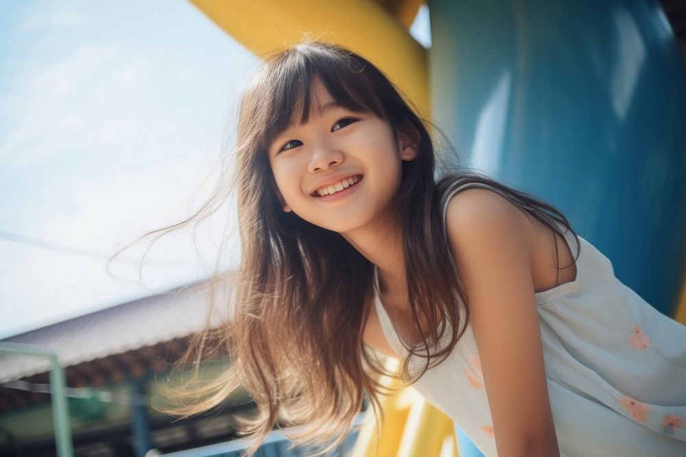 Asian girl relax and smile playground outdoors happiness.