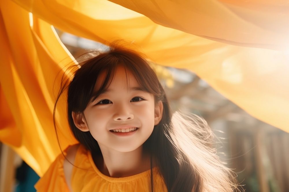 Asian girl relax and smile portrait outdoors child.
