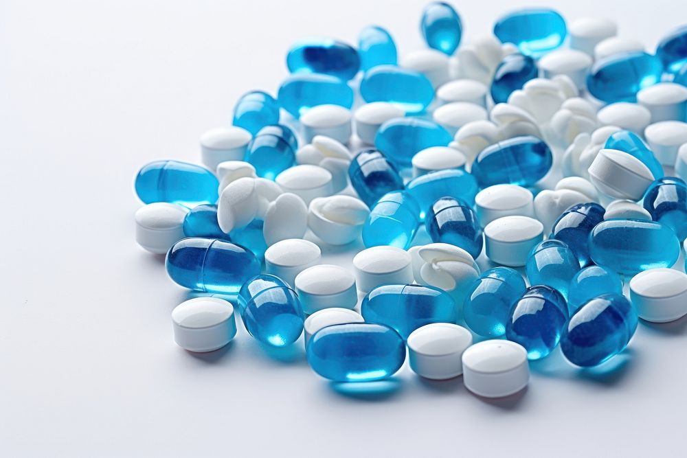Pill capsule blue medication.