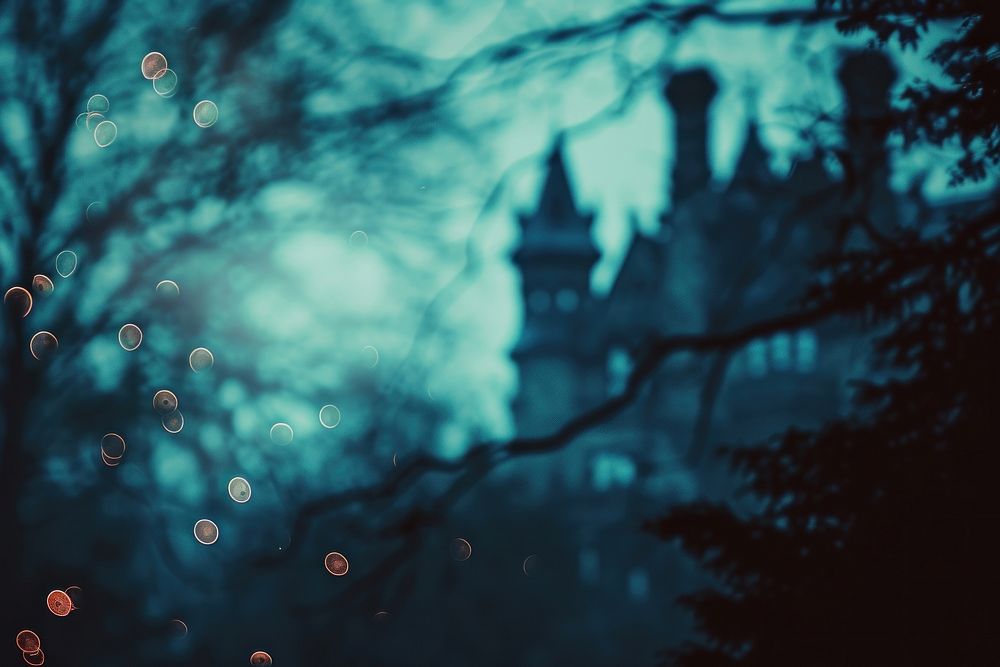 Haunted mansion shaped pattern bokeh effect background light outdoors night.