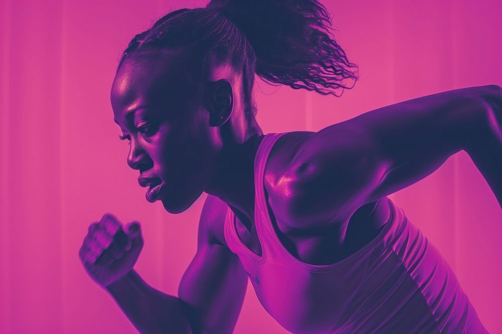 Black female athlete is running purple adult determination.