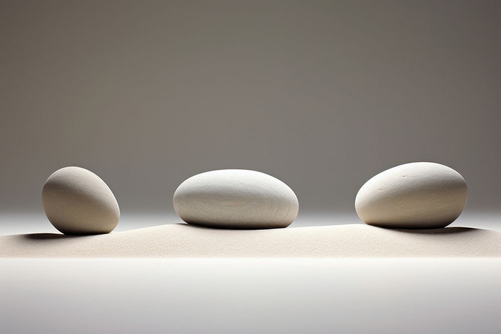 Zen style of rocks in a sand gray egg simplicity.