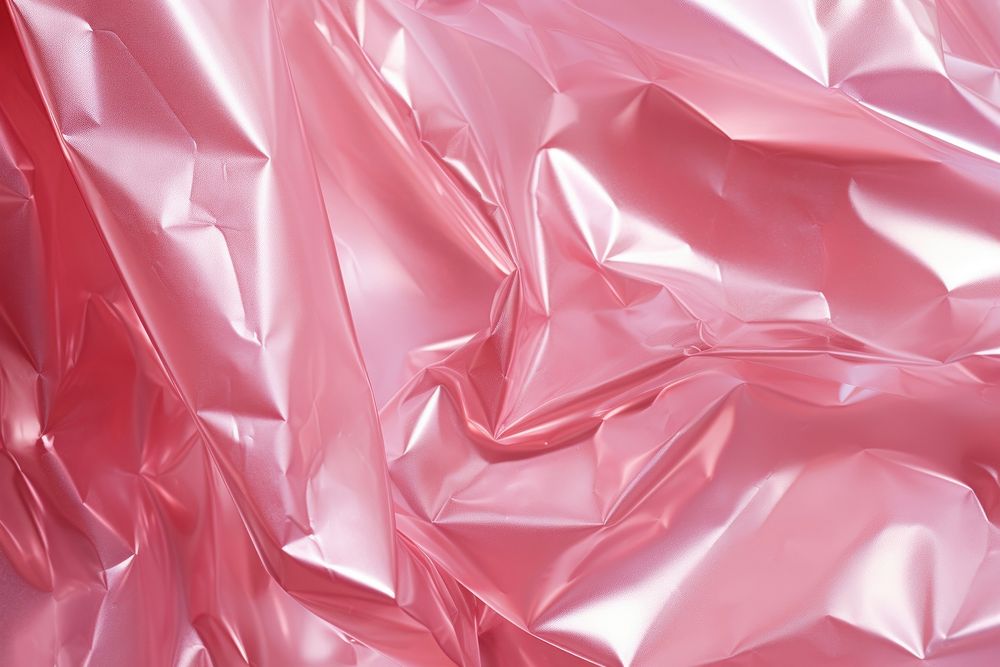 Cellophane texture silk pink backgrounds.