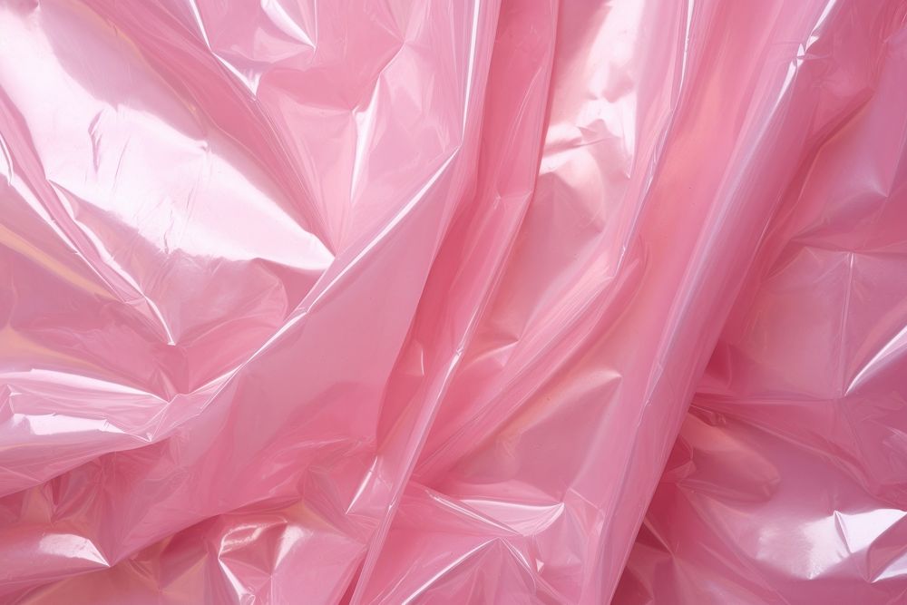 Cellophane texture pink backgrounds crumpled.