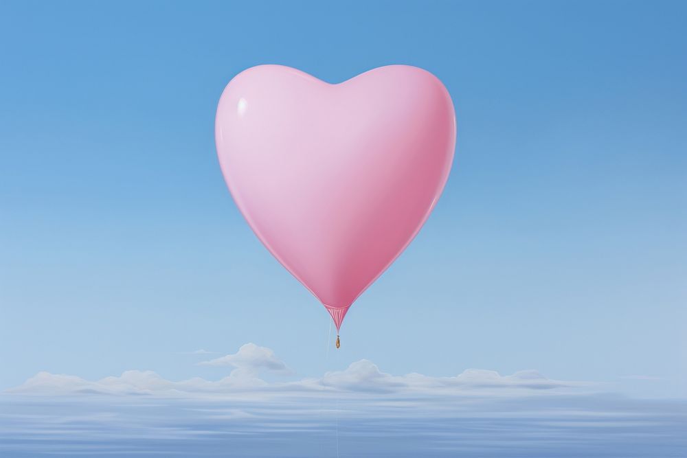 Minimal space a heart shaped balloon flying blue sky.