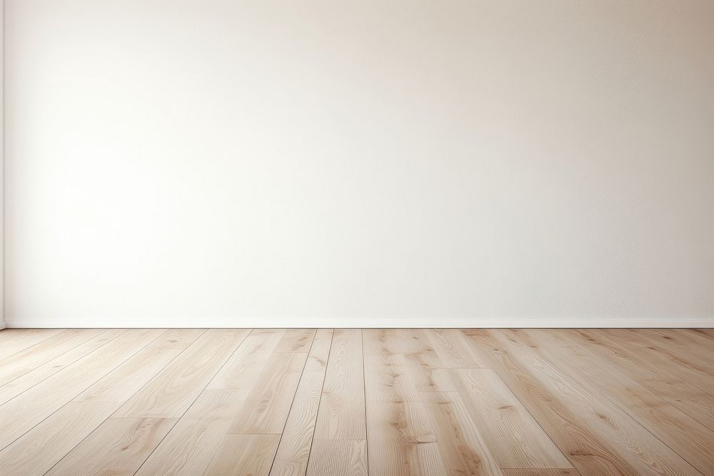 White wall in an empty room with a wooden floor flooring hardwood architecture.