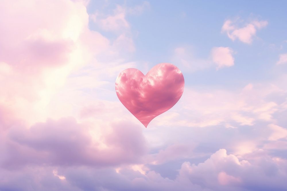 Heart shaped on sky backgrounds balloon pink.