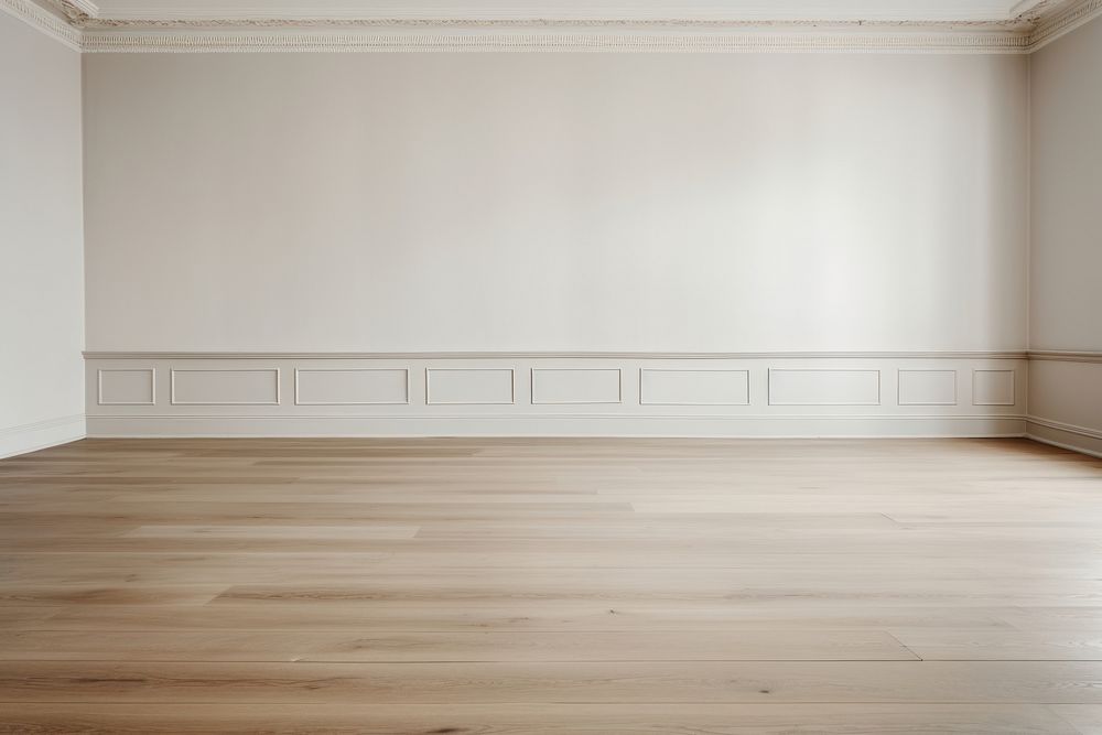 Gary wall in an empty room with a wooden floor flooring architecture backgrounds.