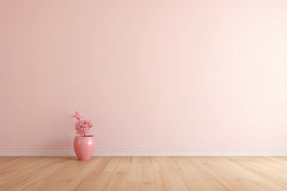 Light pink wall in an empty room with a wooden floor architecture flooring flower.