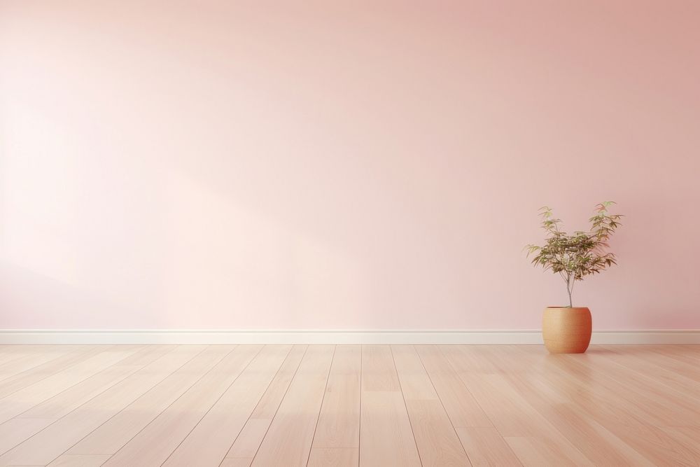 Light pink wall in an empty room with a wooden floor architecture flooring hardwood.