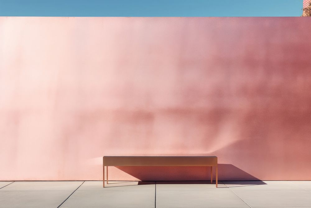 Rose gold color wall architecture outdoors.