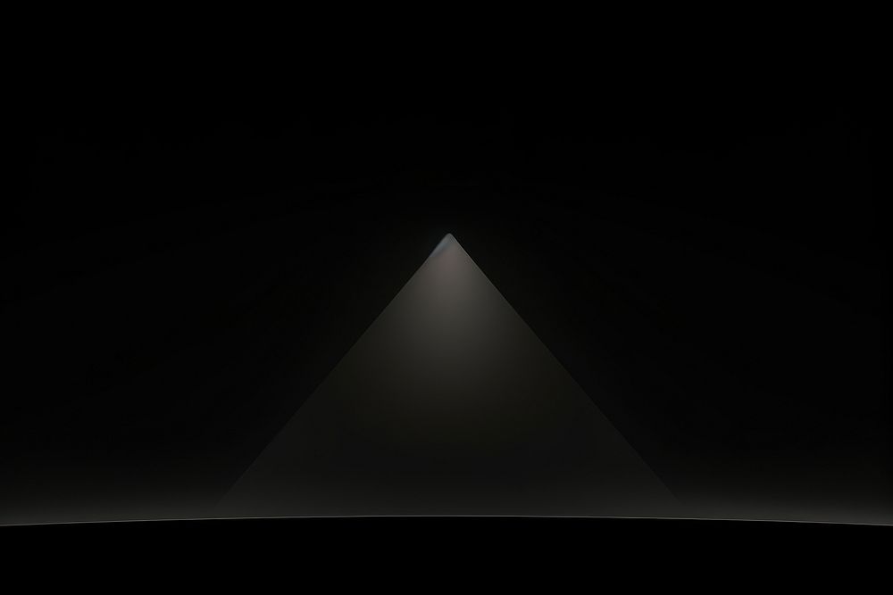 Black spotlight pyramid architecture.